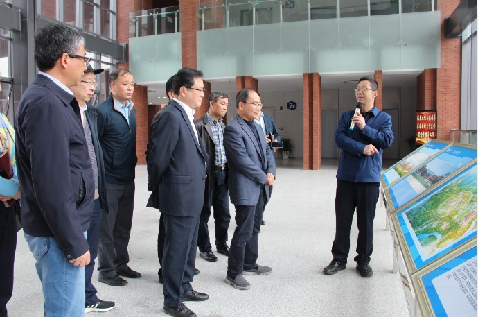 重庆市政协副主席吴刚、屈谦率队调研重庆研究院